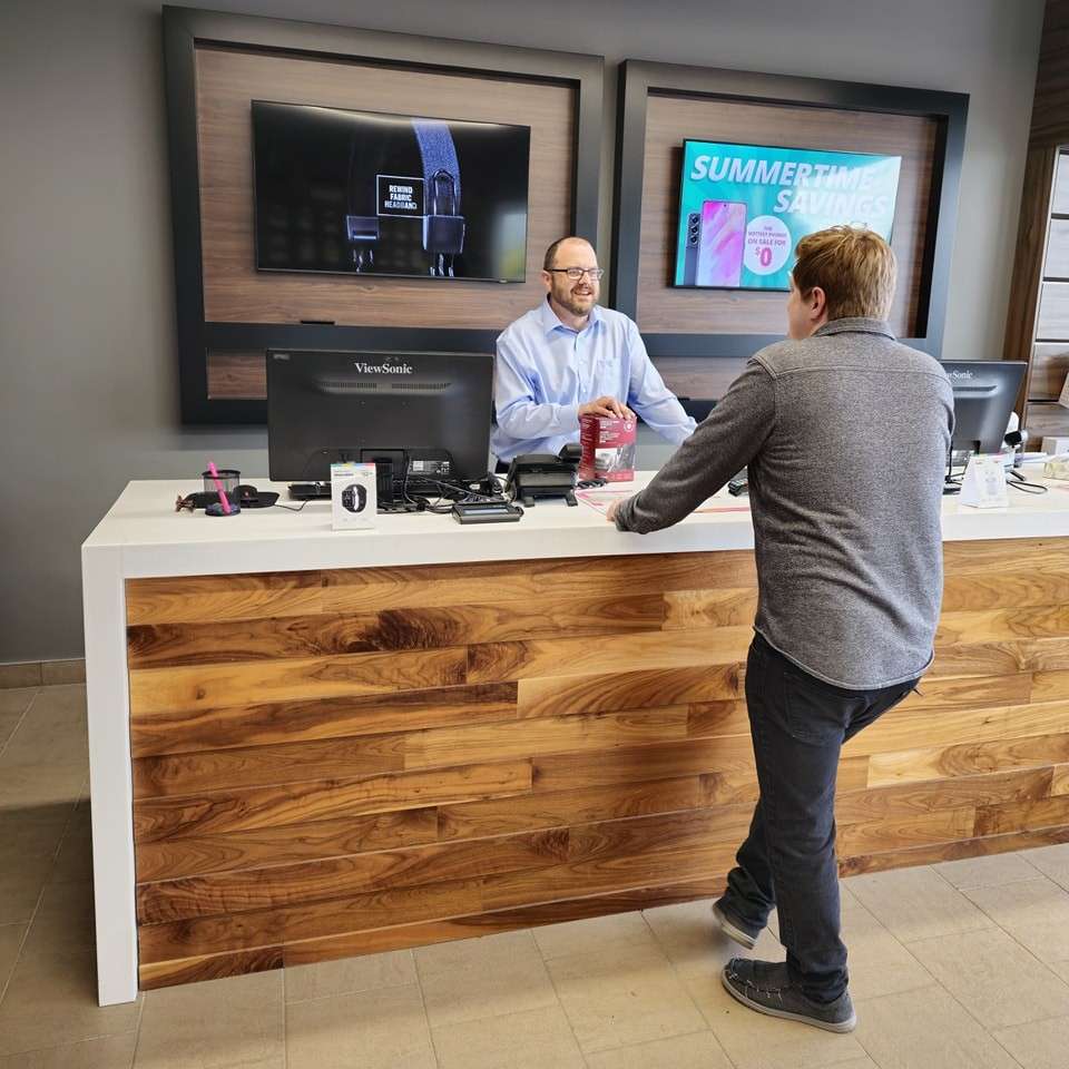 A Jump employee chatting with a customer.